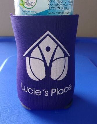 Purple drink koozie with all white logo